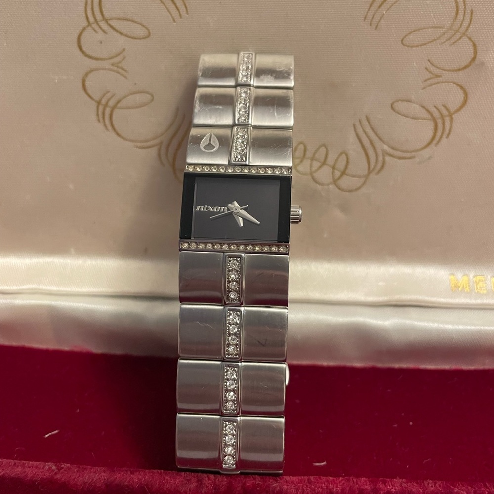 Nixon watch.